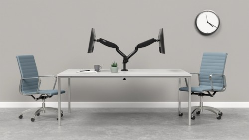 Bras double écran AOC AD110D0 installé sur un bureau organisé